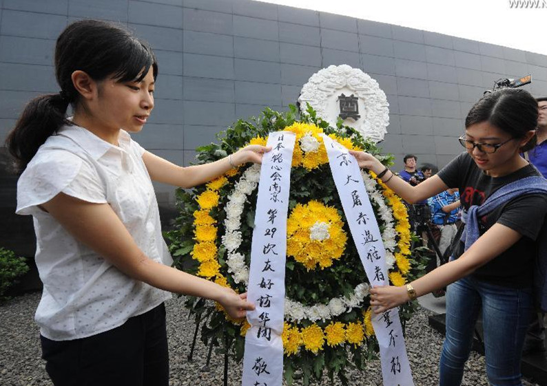 People attend assembly to mourn for victims of Nanjing Massacre.jpg