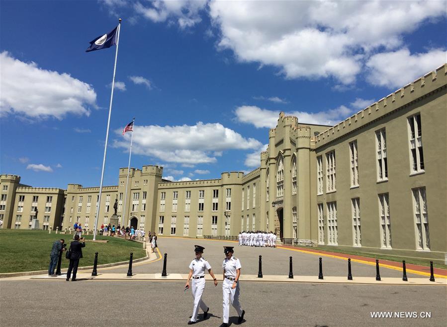 visitors view soaring tide of qiantang river